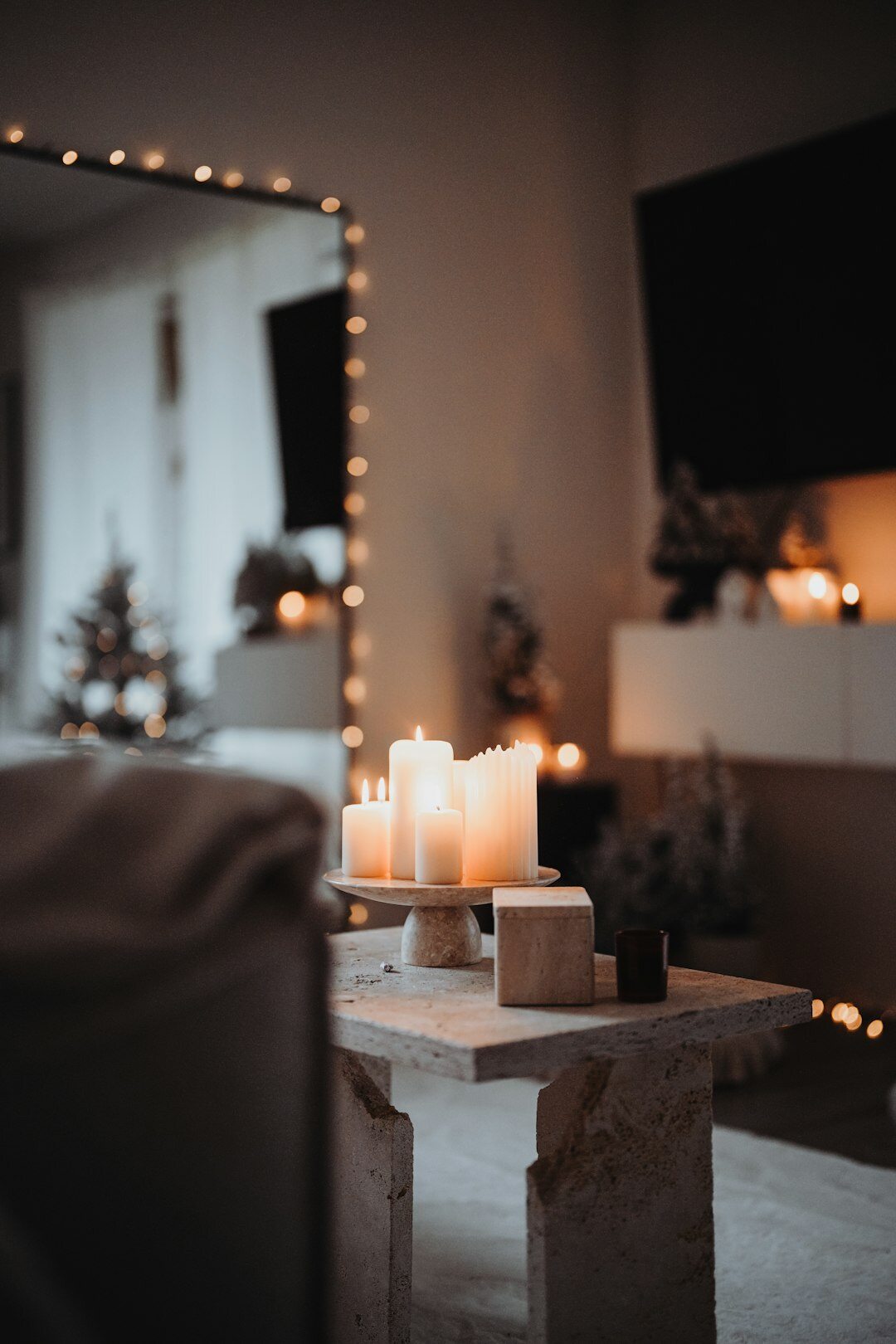 Cozy candlelit living room in winter, Danish hygge